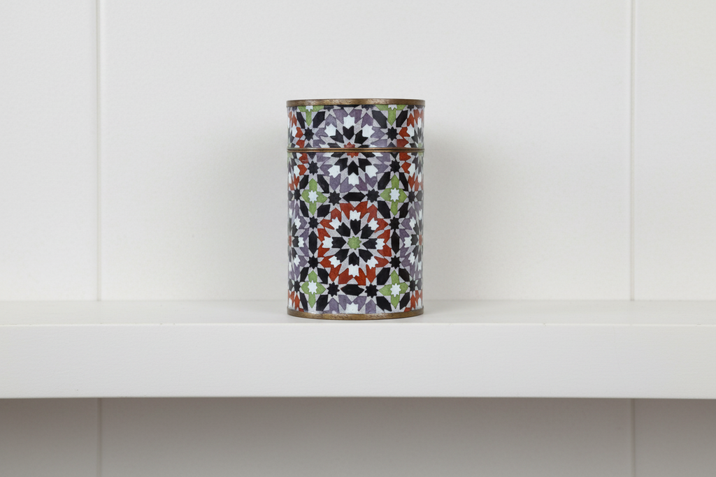 Decorative Cylindrical Metal Container with a Colorful Geometric Pattern