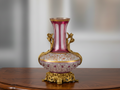 Decorative Vase with Gold Accents and Pink Glass