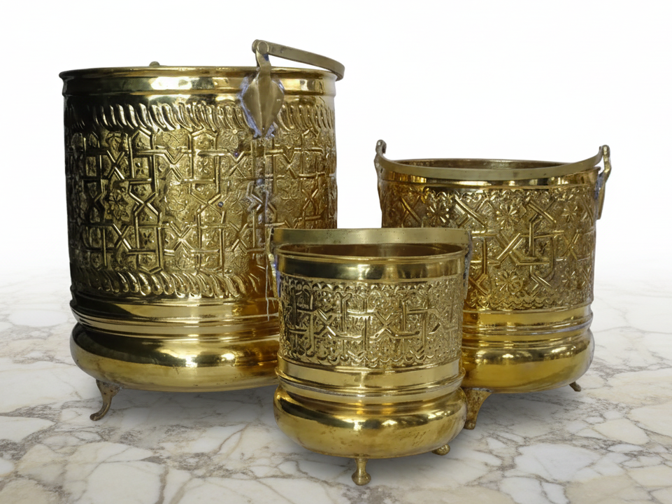 Three Ornate Brass Buckets with Intricate Design